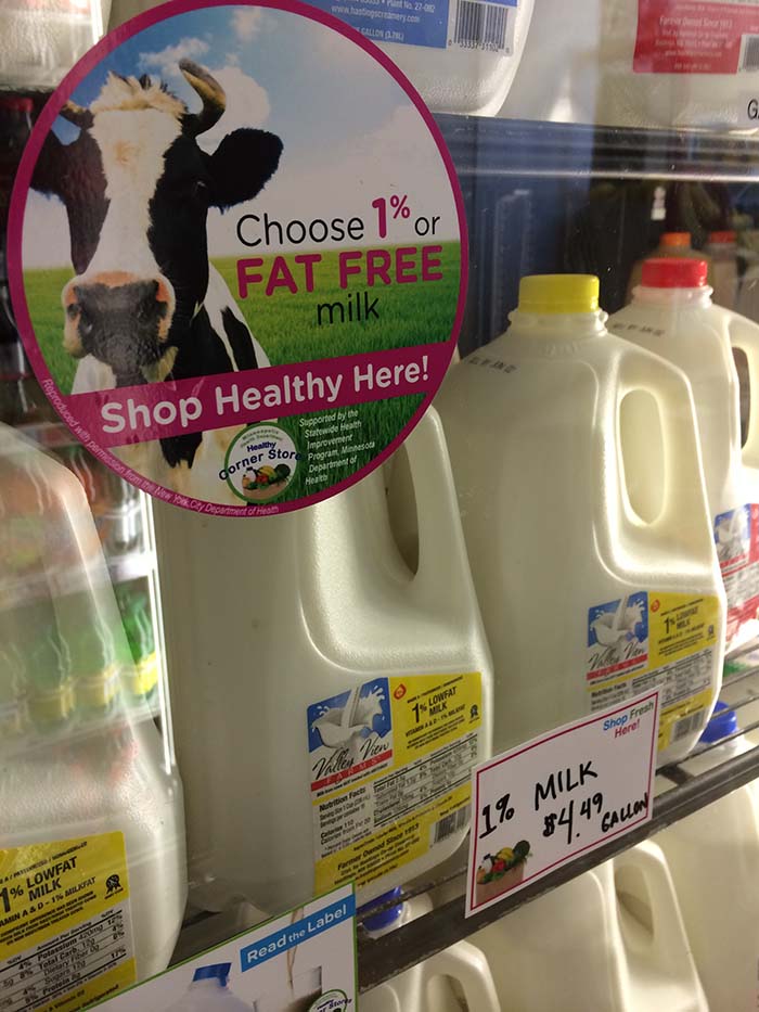 fresh milk on store shelf